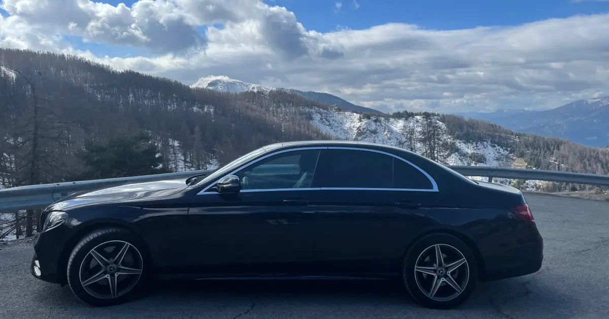 Nice airport Isola 2000 transfer: E class sedan on road to ski resort